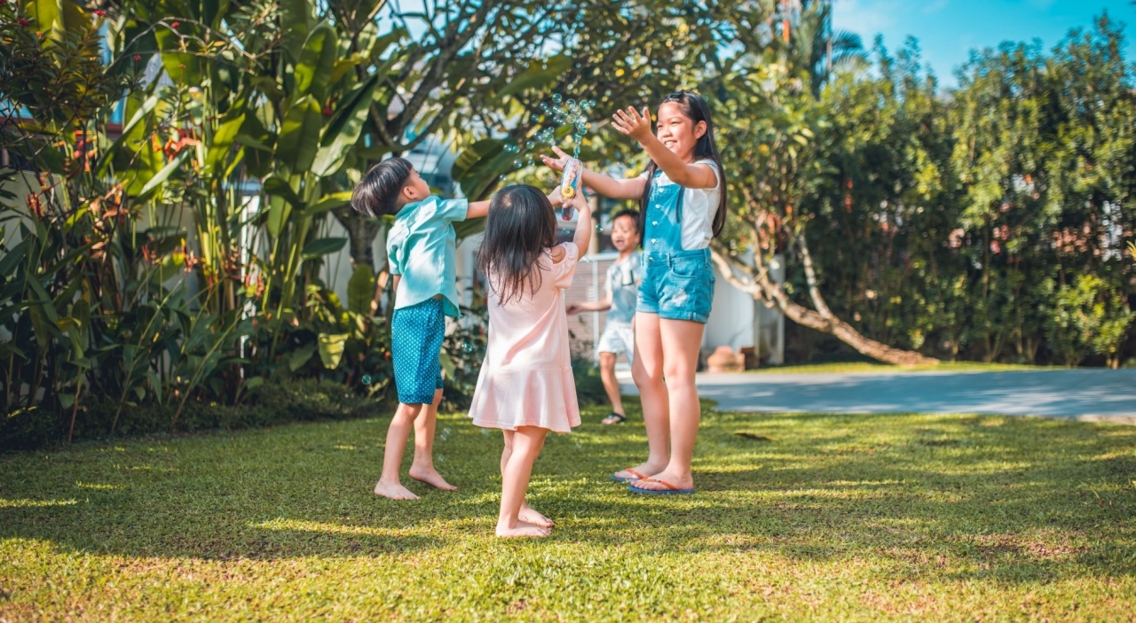 children playing with bubbles